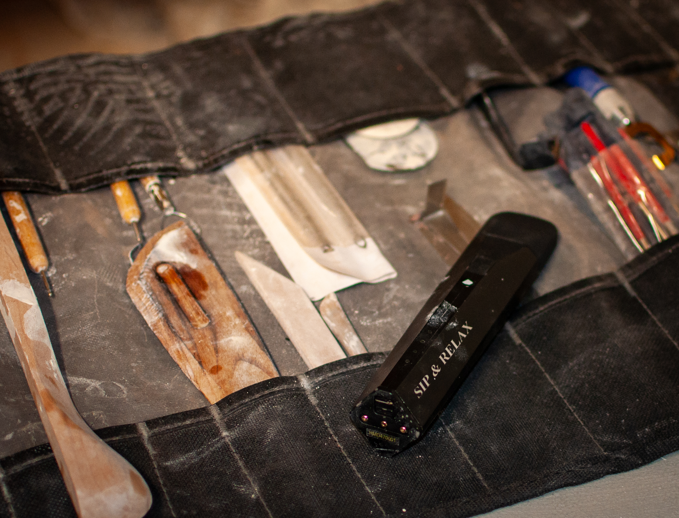 Mixturus and tools on black organizer