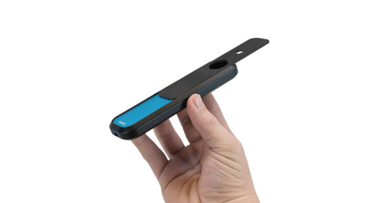 Black Oasis vaporizer held in hand