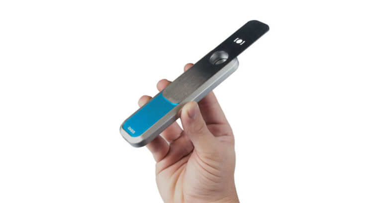 Silver Oasis botanical vaporizer held in hand