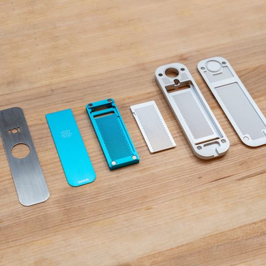 OASIS fully disassembled — all parts laid out for easy cleaning