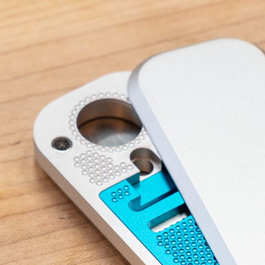 OASIS cooling chamber close-up showing perforated cooling system and teal insert